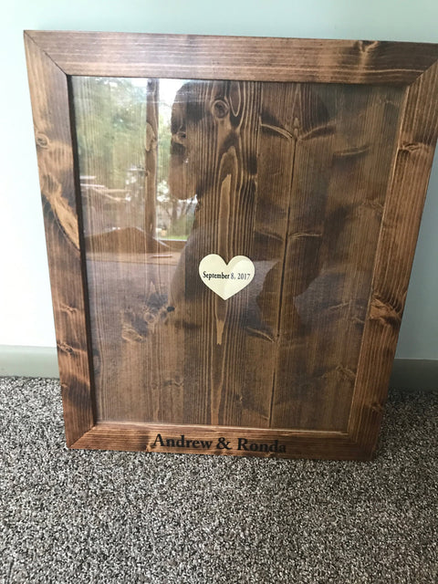 custom wooden frame with glass