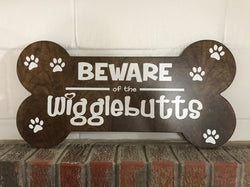 beware of the wigglebutts wooden sign